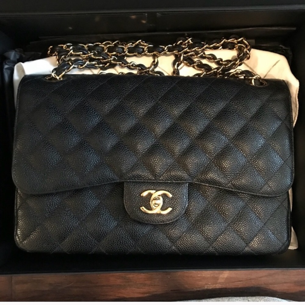 Chanel Jumbo Black caviar double flap.